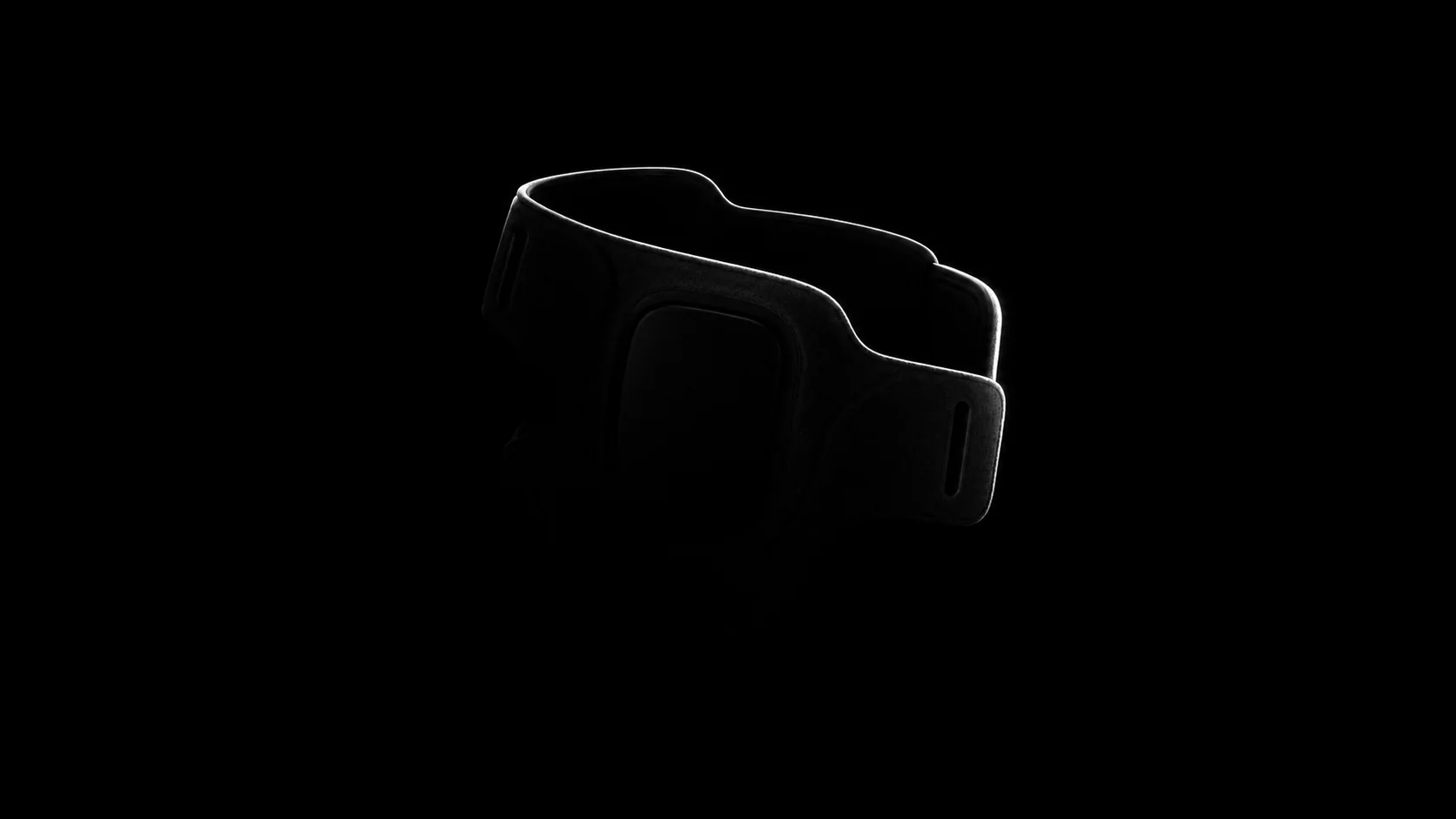 The Overlast sleeve, almost entirely in shadow, with light catching only its outline.